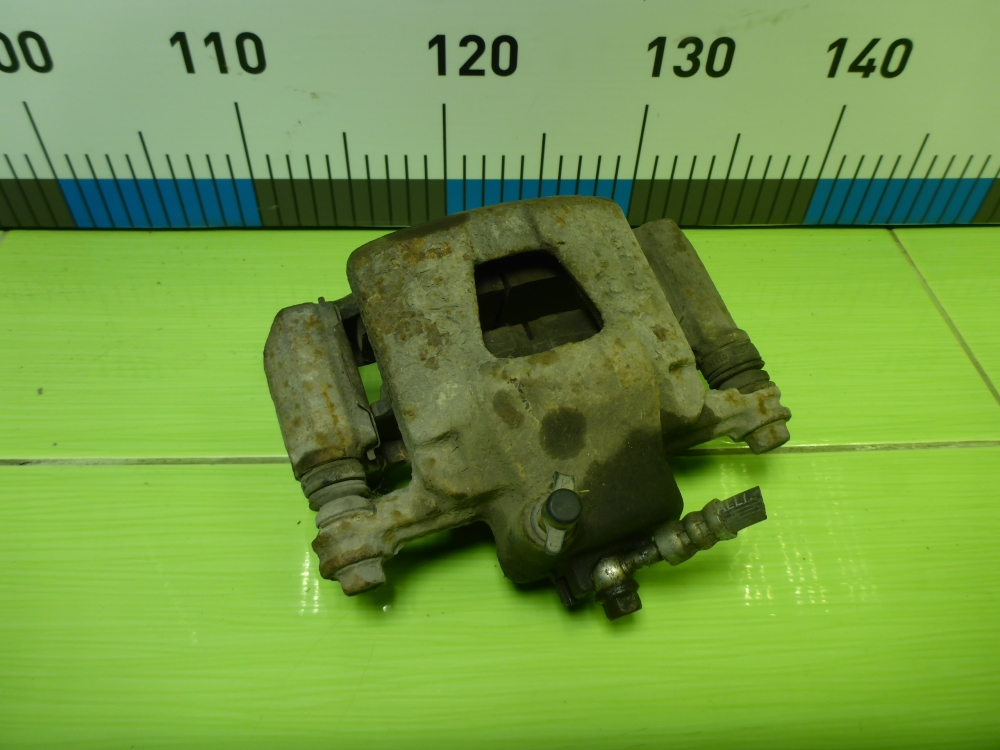 Суппорт передний левый