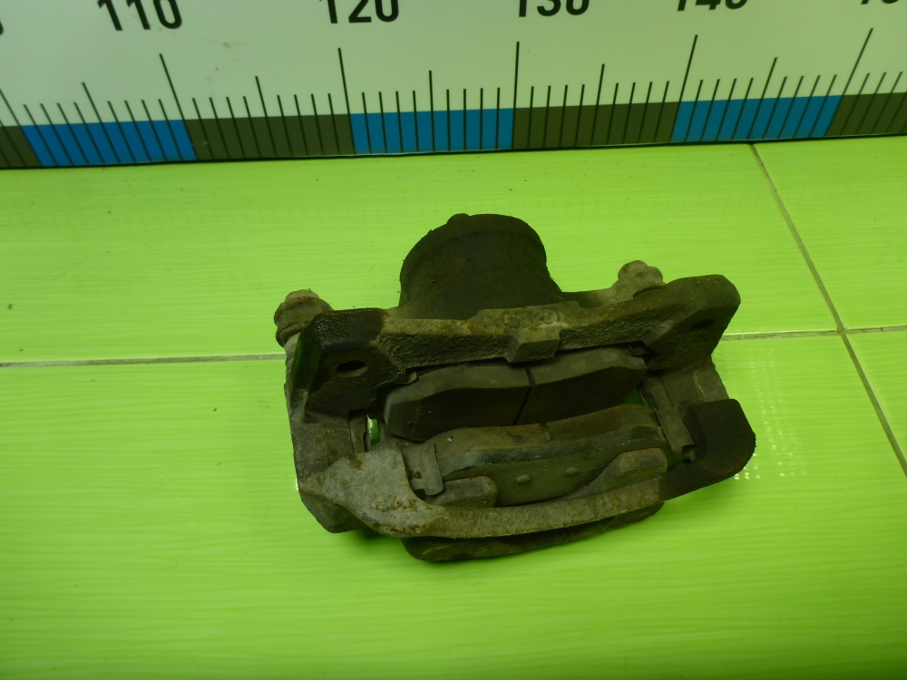 Суппорт передний левый