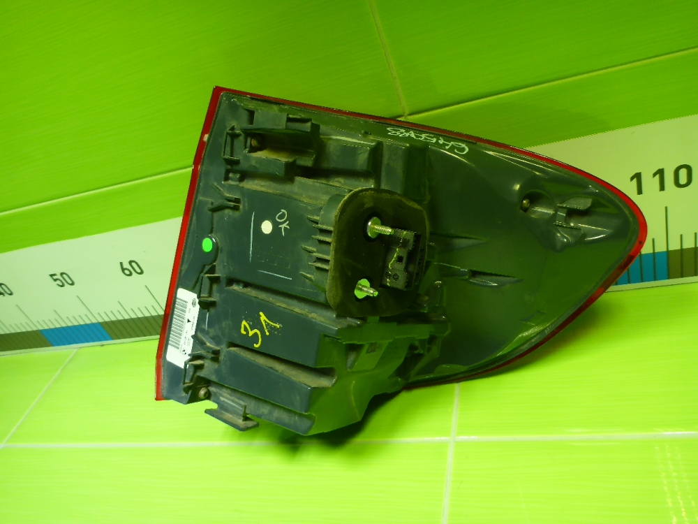 Фонарь задний наружный левый