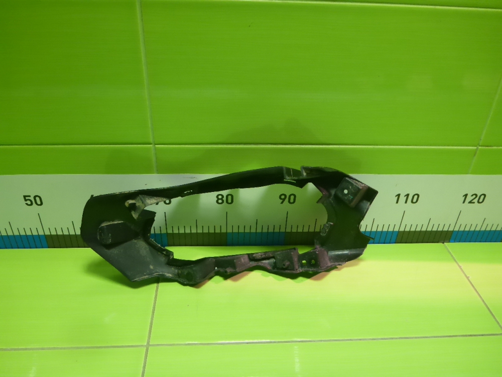 Кронштейн заднего бампера левый