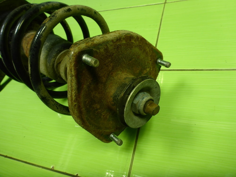 Амортизатор передний левый