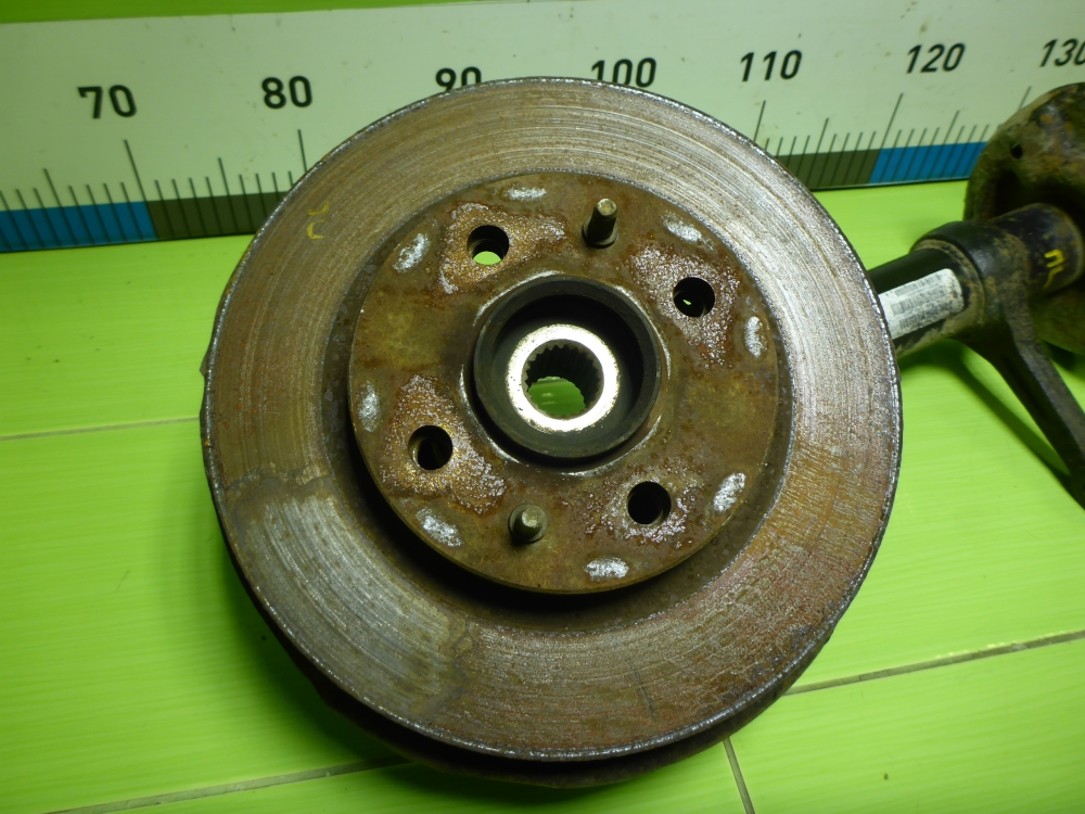 Амортизатор передний левый