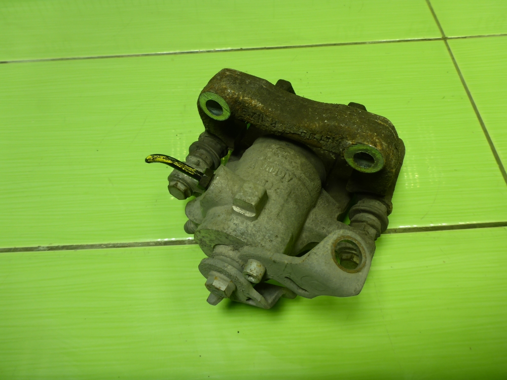 Суппорт задний левый