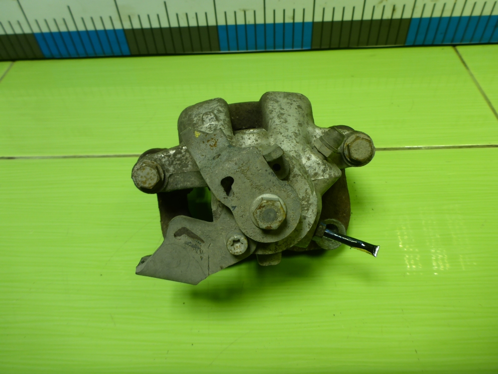 Суппорт задний левый