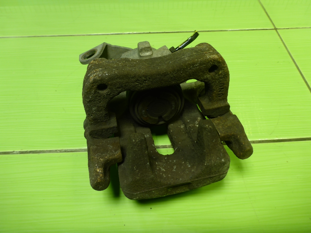 Суппорт задний левый