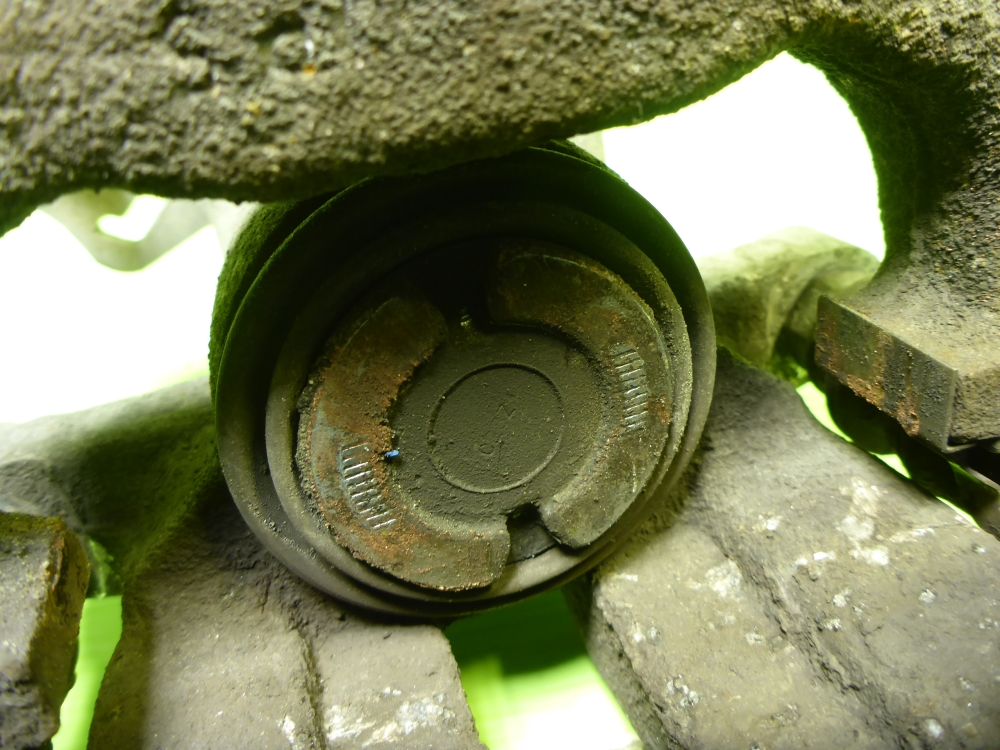 Суппорт задний левый