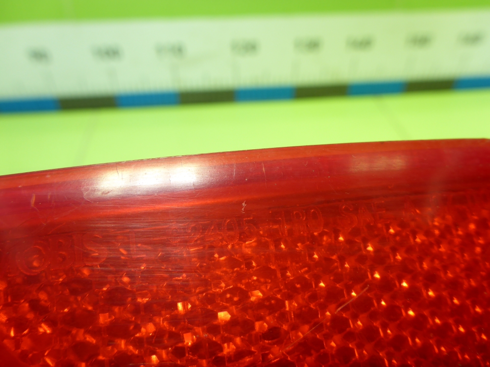 Отражатель в бампер задний левый