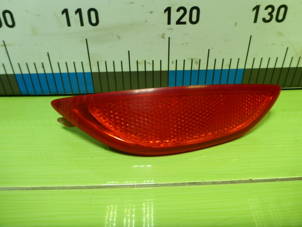 Отражатель в бампер задний левый