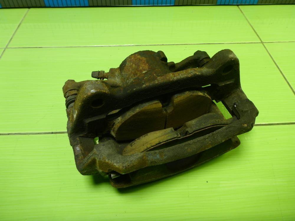 Суппорт передний левый