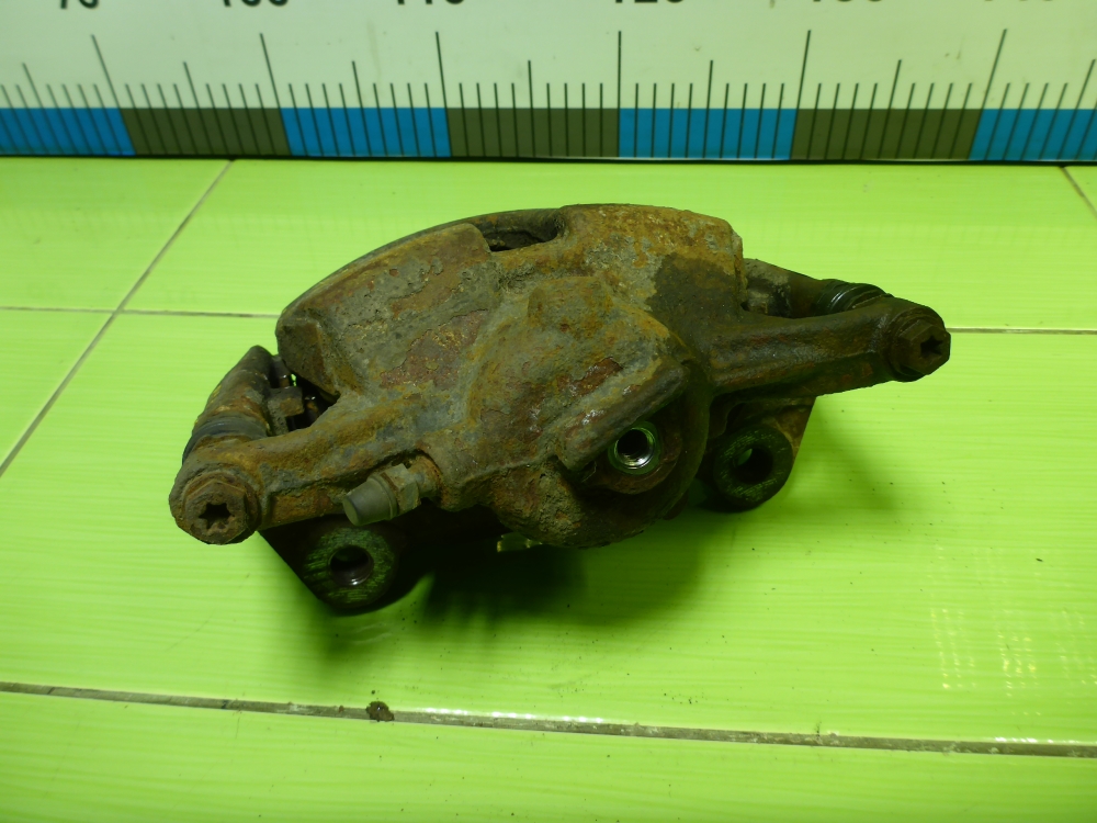 Суппорт передний левый