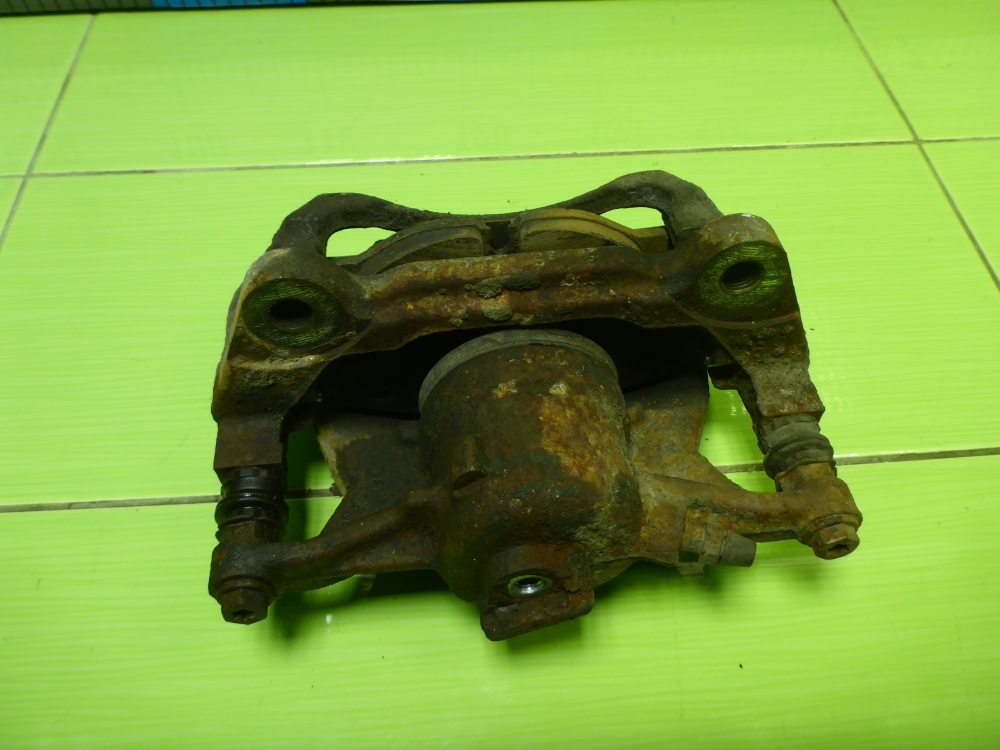 Суппорт передний левый