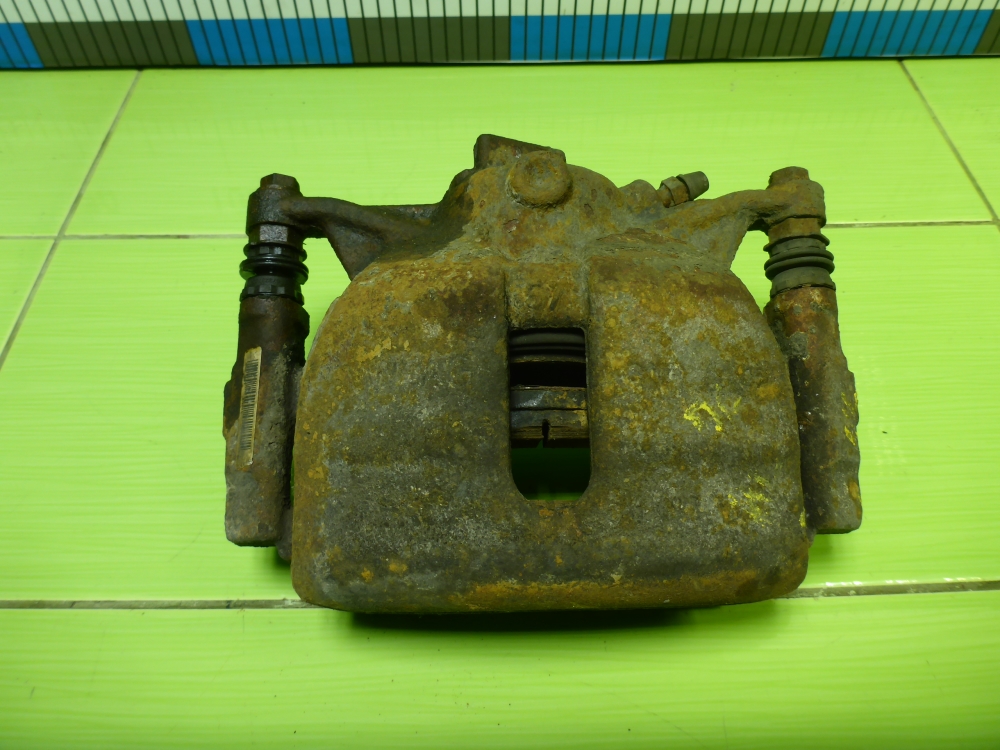 Суппорт передний левый