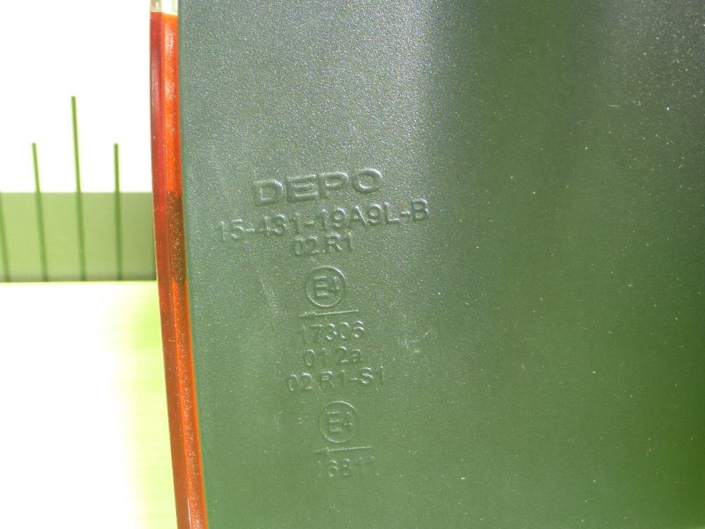 Фонарь задний наружный левый