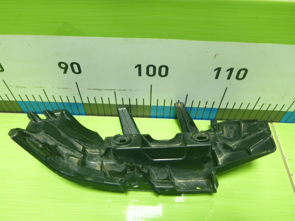 Кронштейн заднего бампера левый