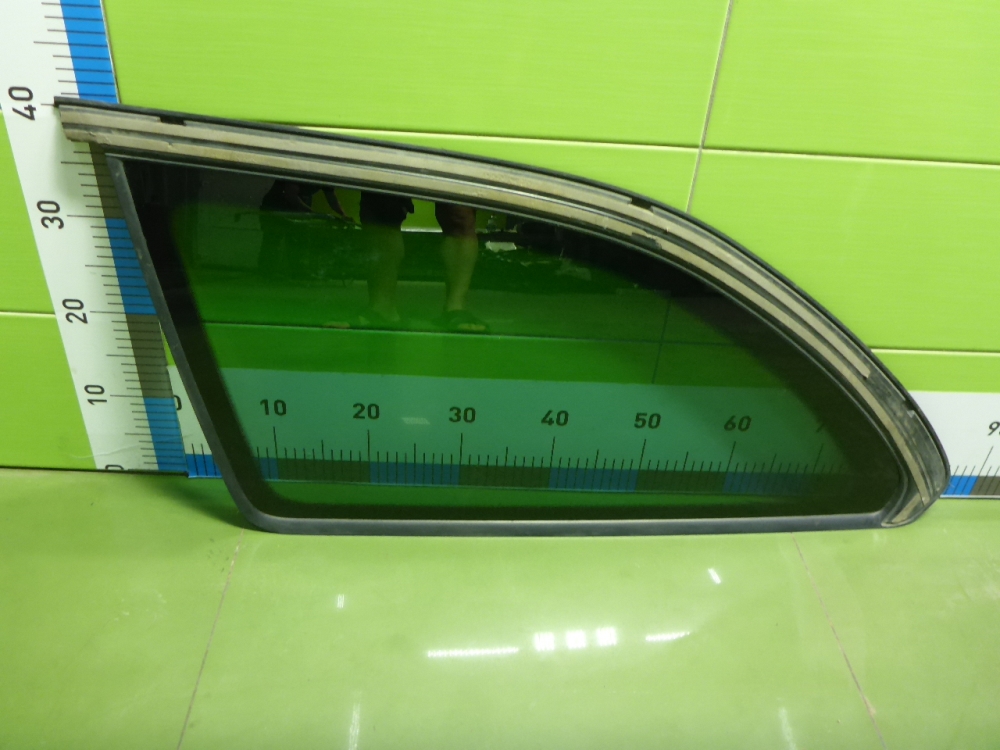 Стекло кузовное глухое левое