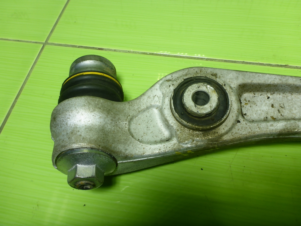 Рычаг передний нижний левый