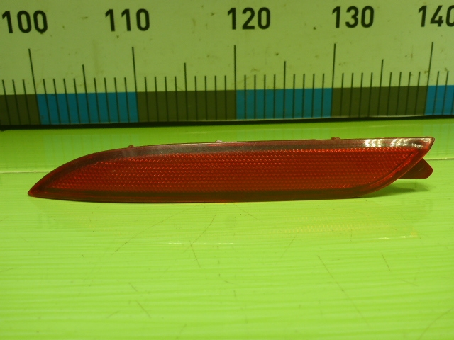 Отражатель в бампер задний левый