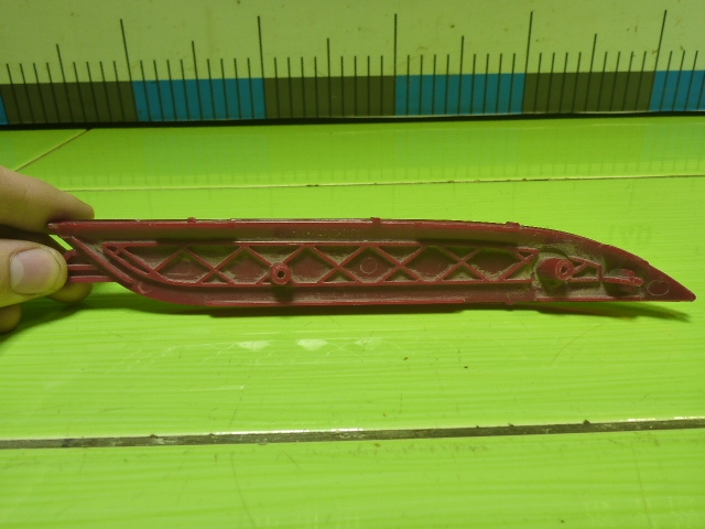 Отражатель в бампер задний левый