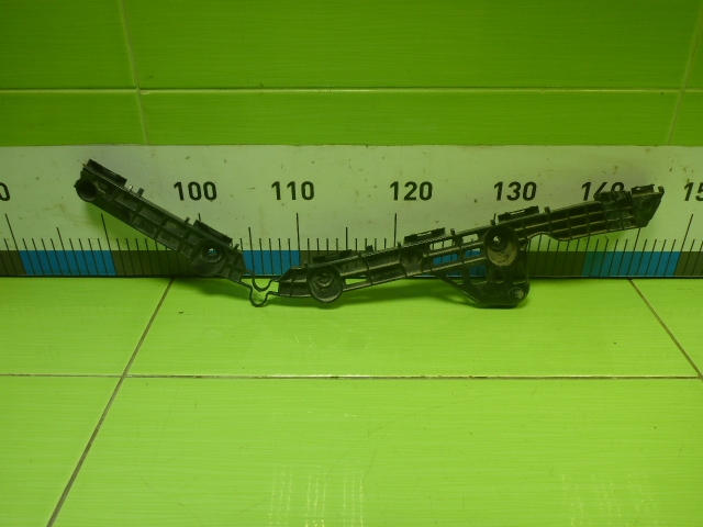 Кронштейн заднего бампера правый