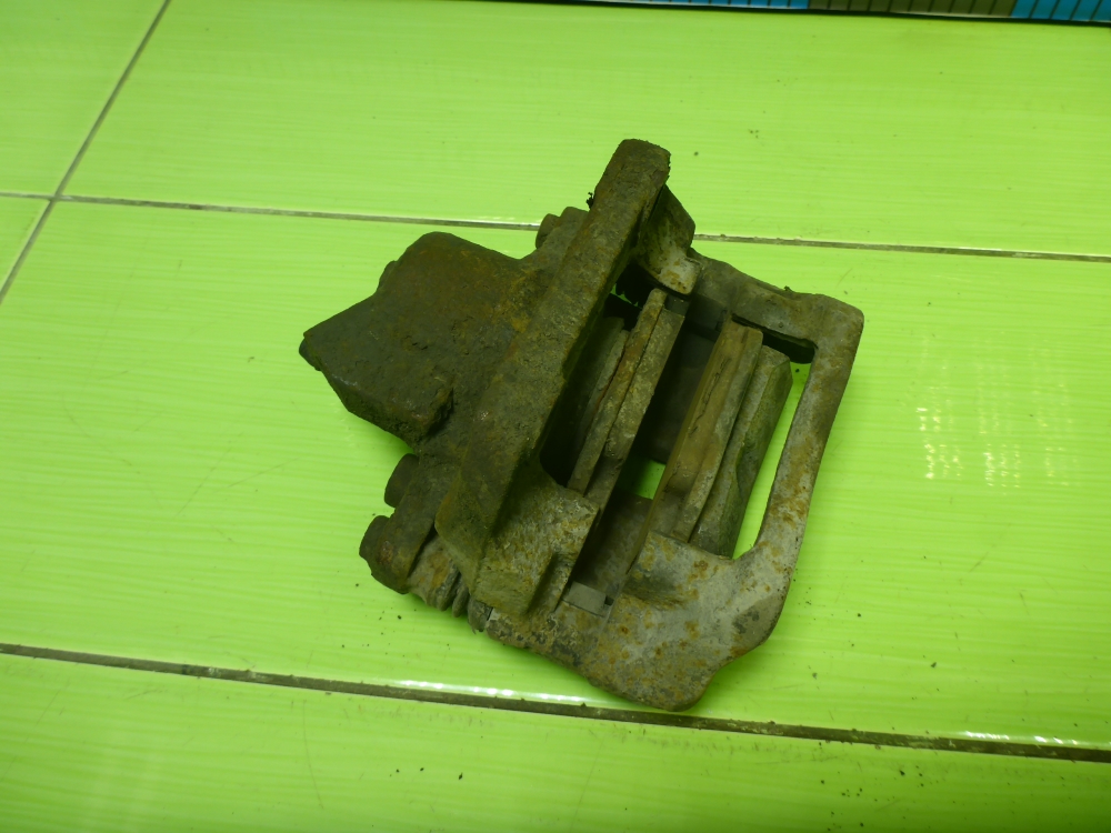 Суппорт передний левый