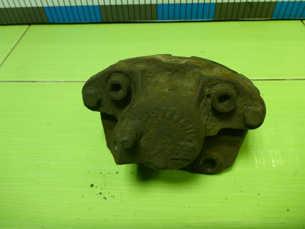 Суппорт передний левый