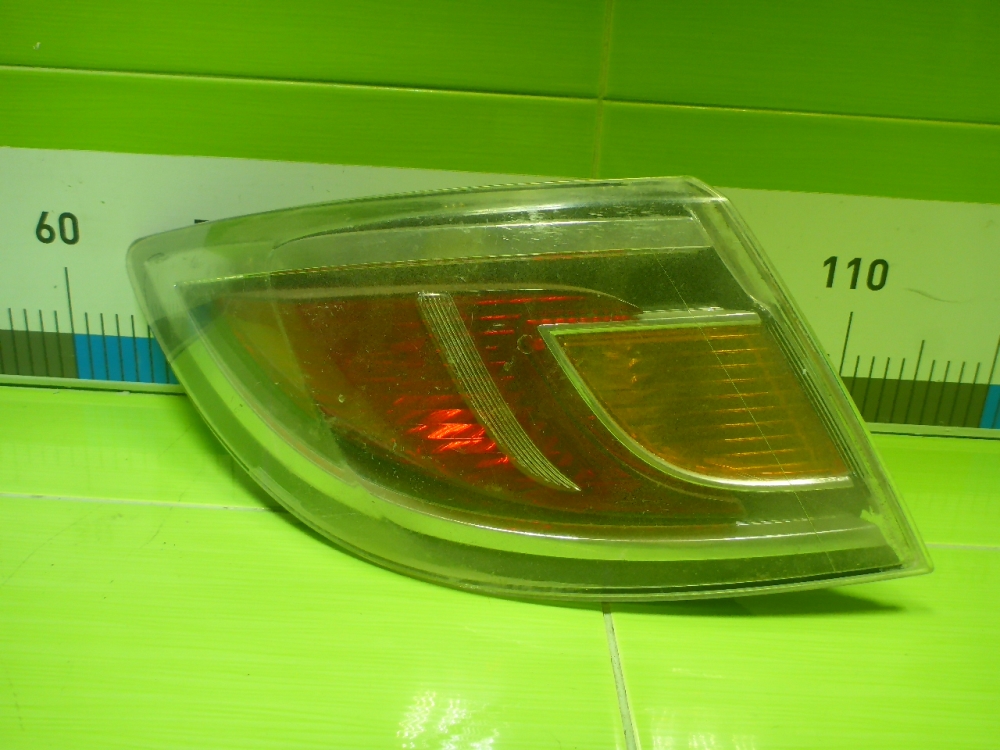 Фонарь задний наружный левый