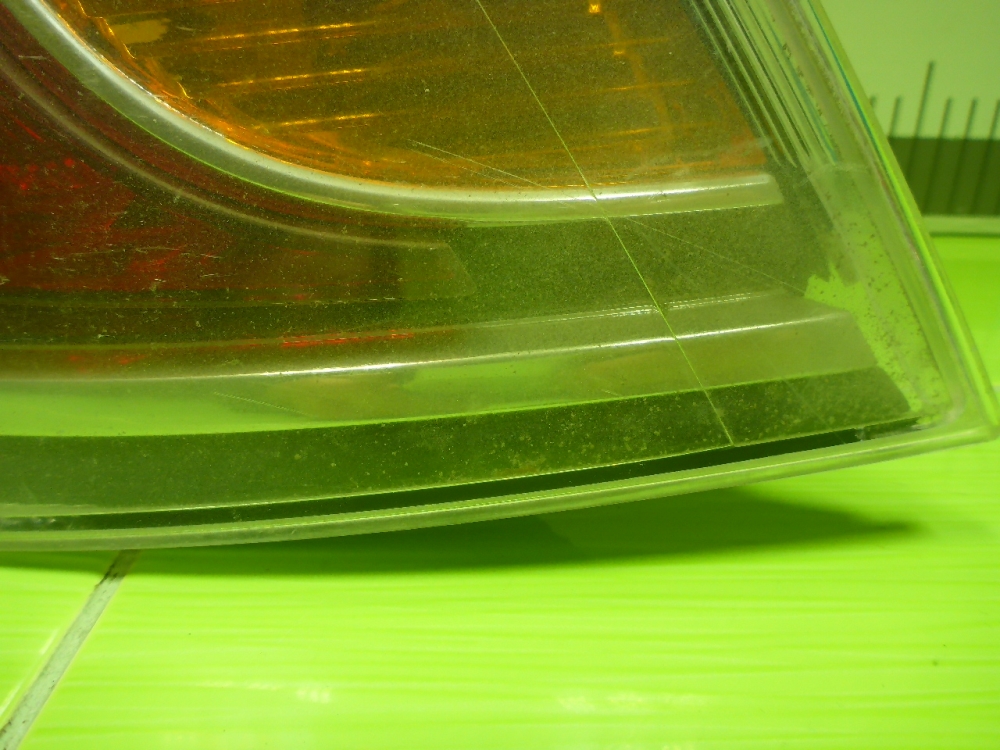 Фонарь задний наружный левый