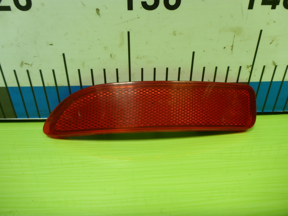 Отражатель в бампер задний левый