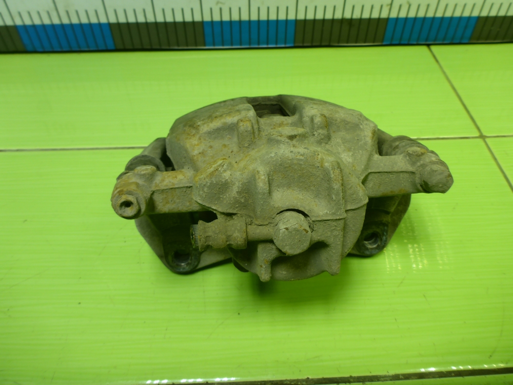 Суппорт передний левый