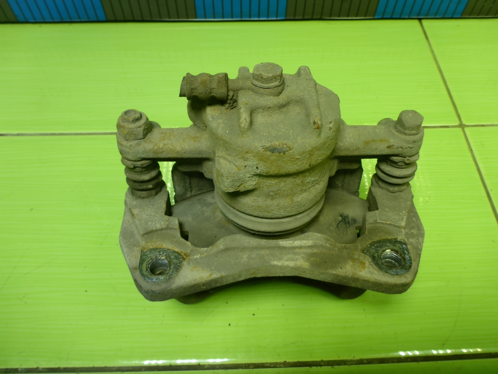 Суппорт передний левый