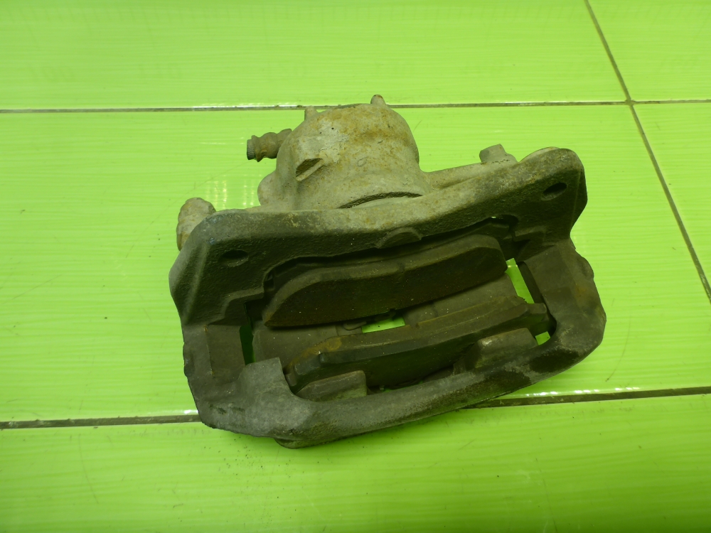 Суппорт передний левый