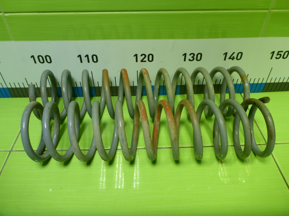 Пружина задняя