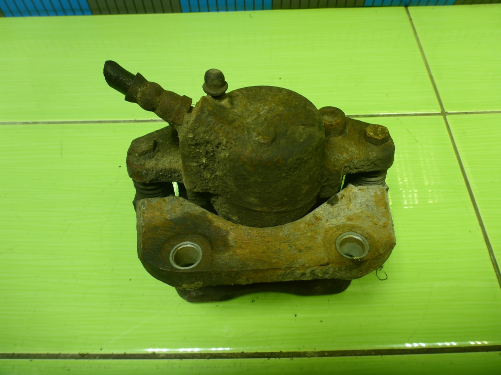 Суппорт передний левый