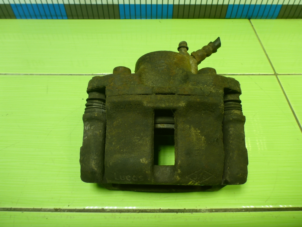 Суппорт передний левый