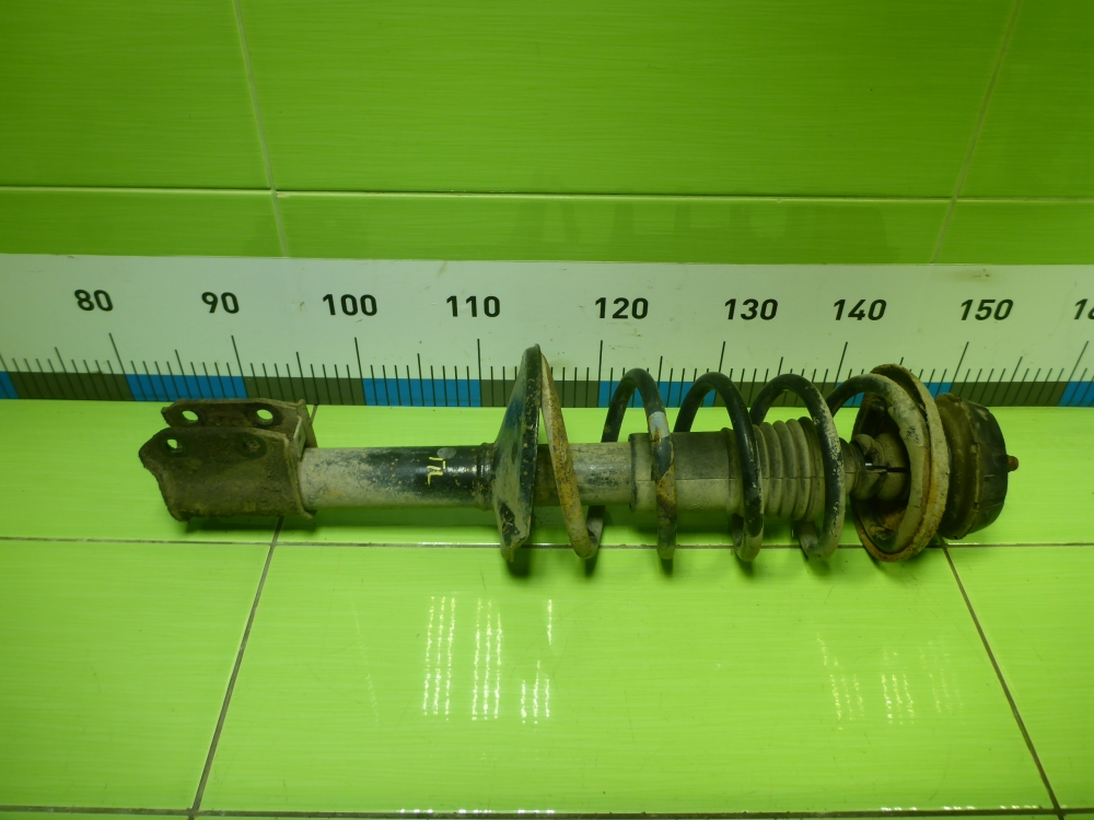 Амортизатор передний левый