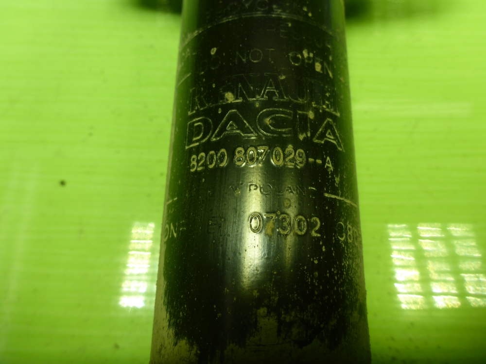 Амортизатор передний левый