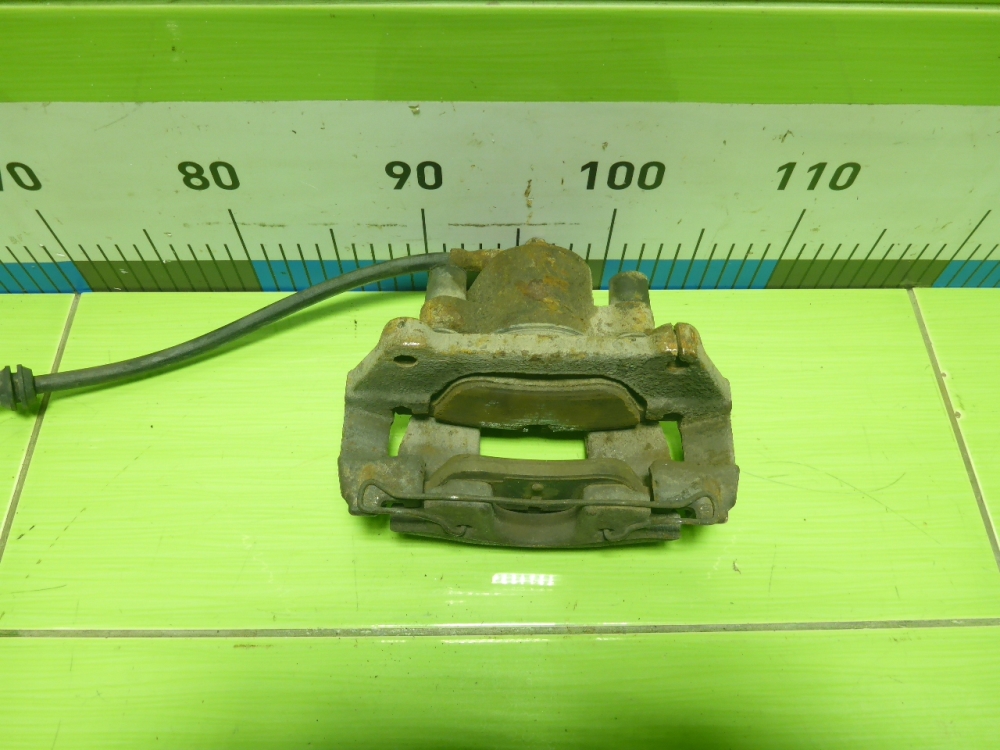 Суппорт передний левый