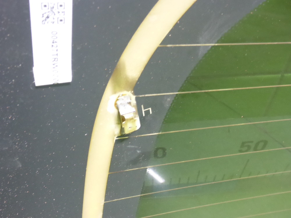 Стекло двери багажника