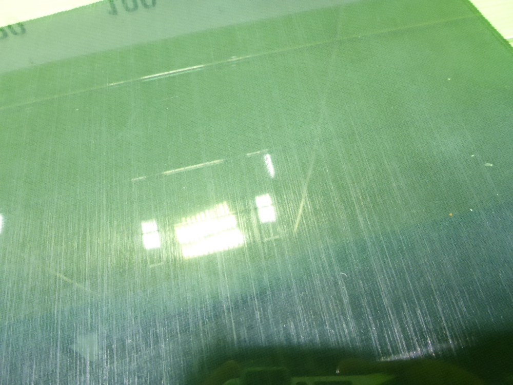 Стекло двери передней левой