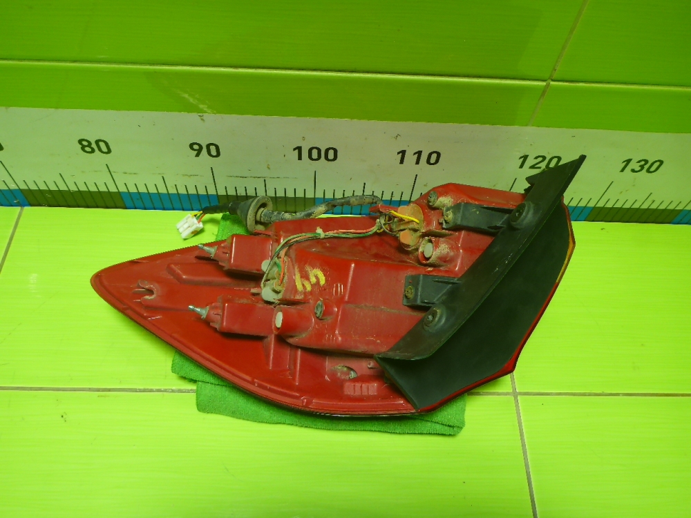 Фонарь задний наружный левый