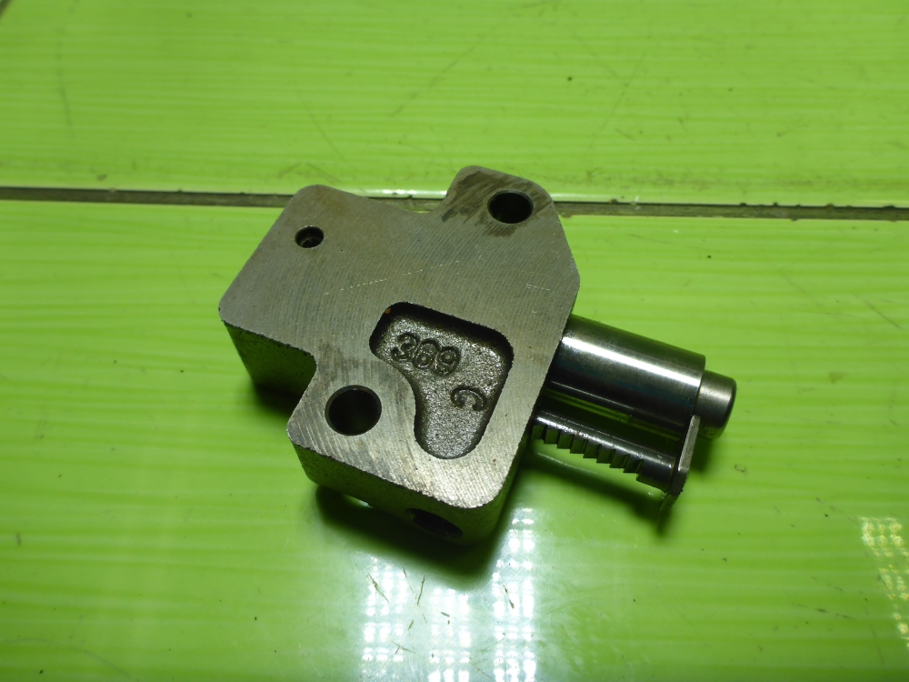 Натяжитель цепи