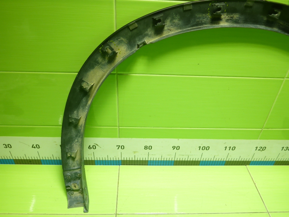 Накладка заднего крыла левого