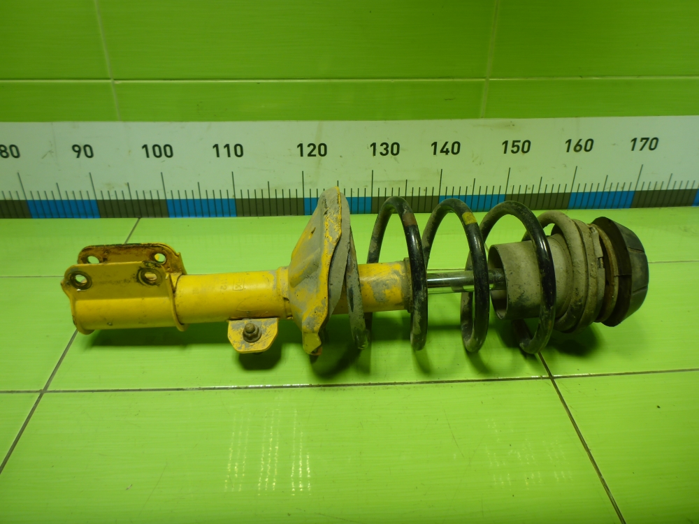 Амортизатор передний левый