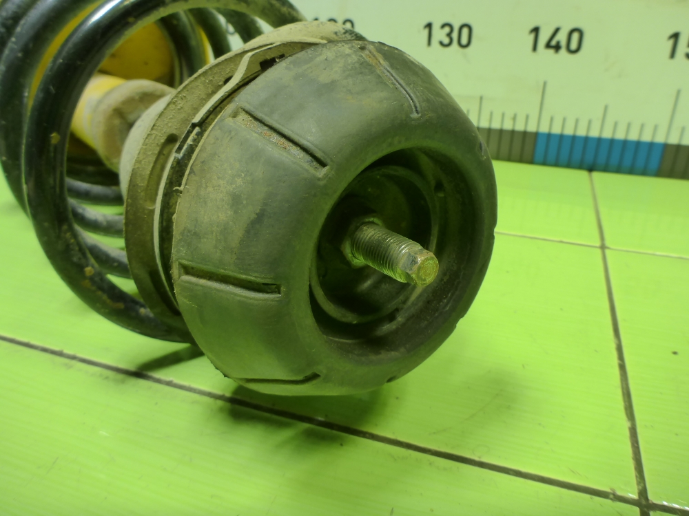 Амортизатор передний левый