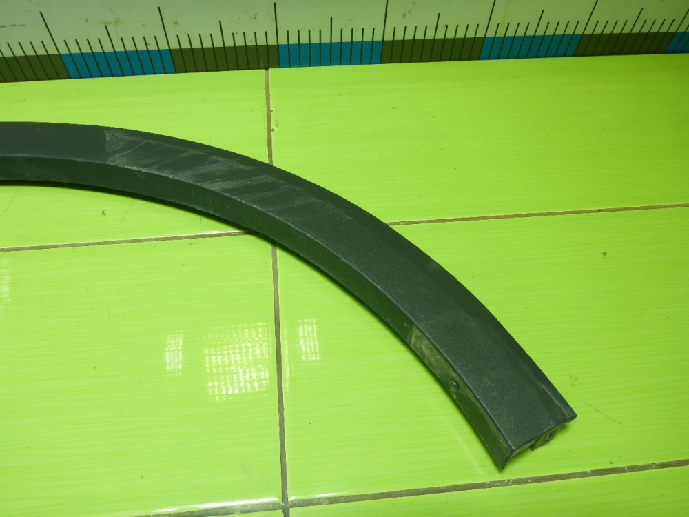 Накладка заднего крыла левого