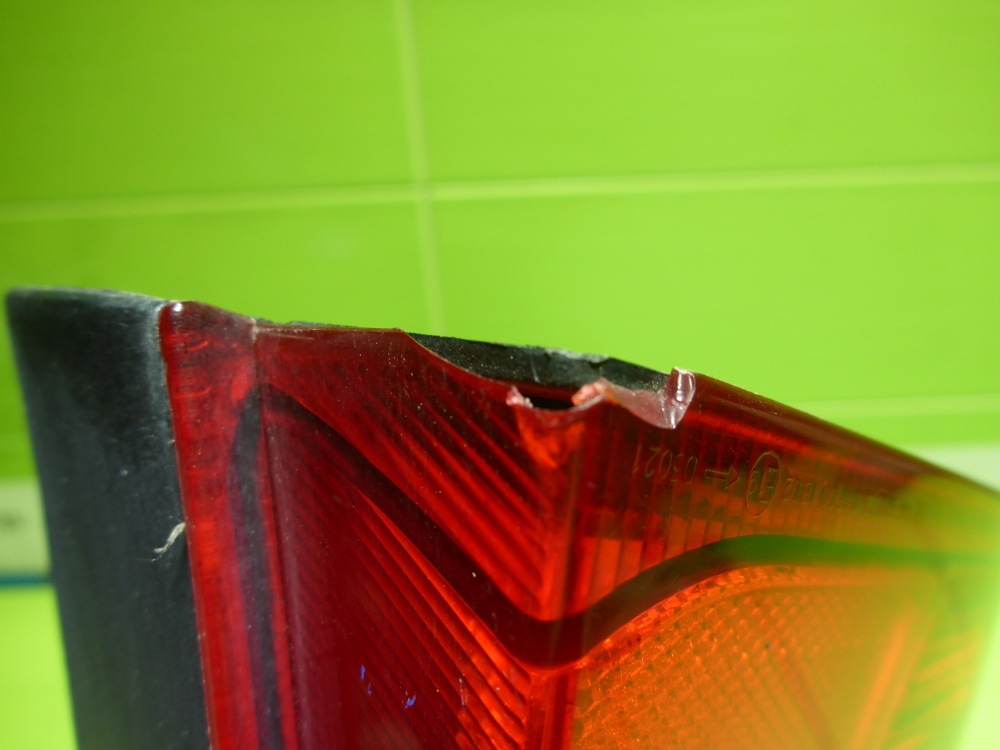 Фонарь задний левый