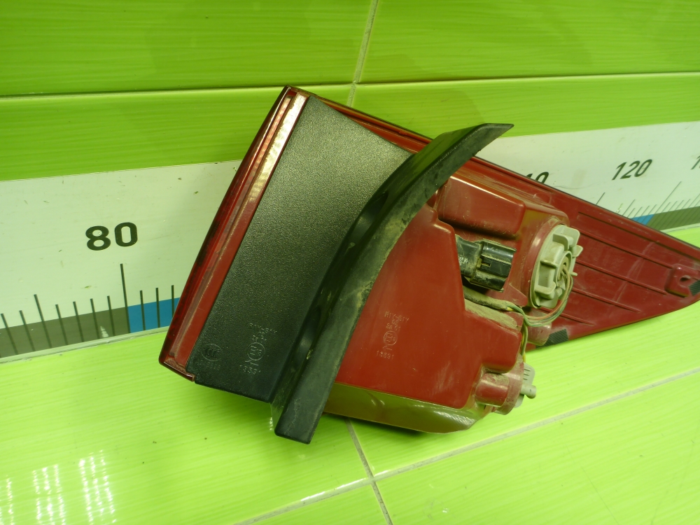 Фонарь задний наружный левый