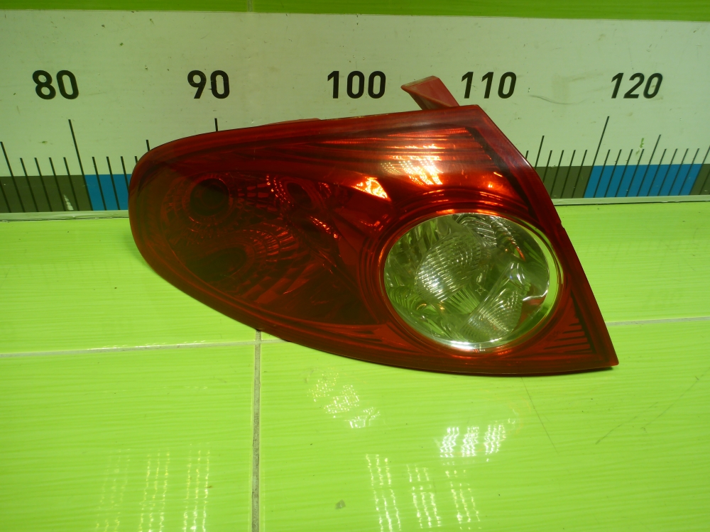 Фонарь задний наружный левый