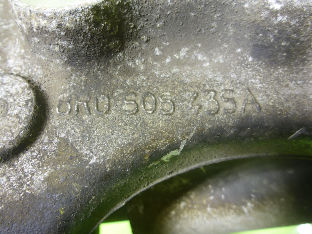 Кулак поворотный задний левый