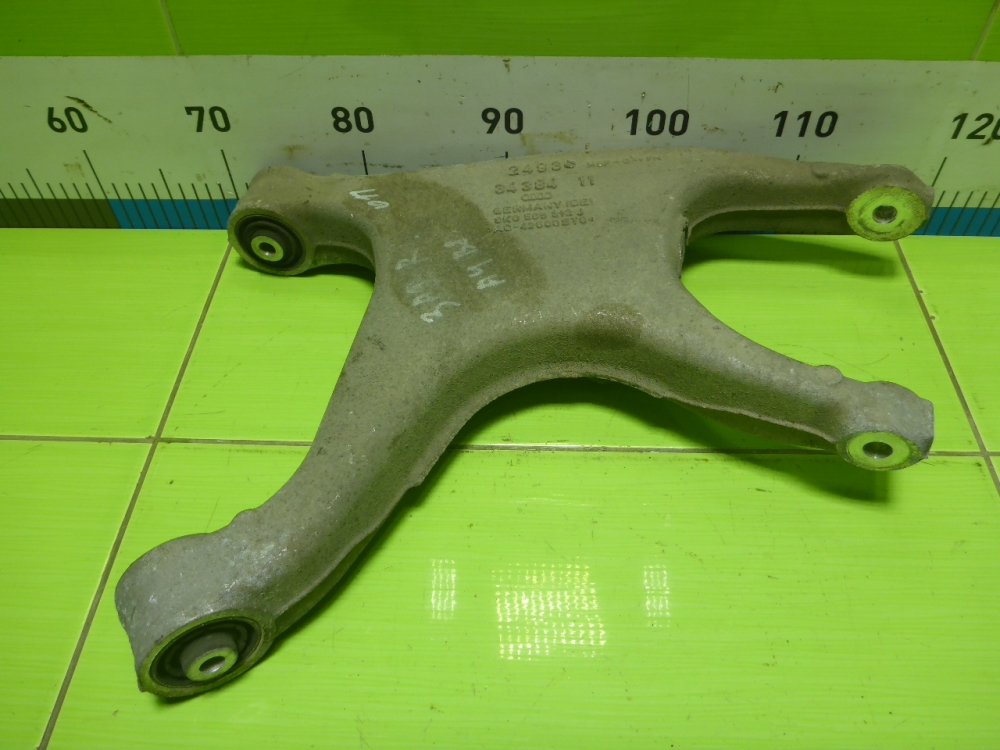 Рычаг задний нижний